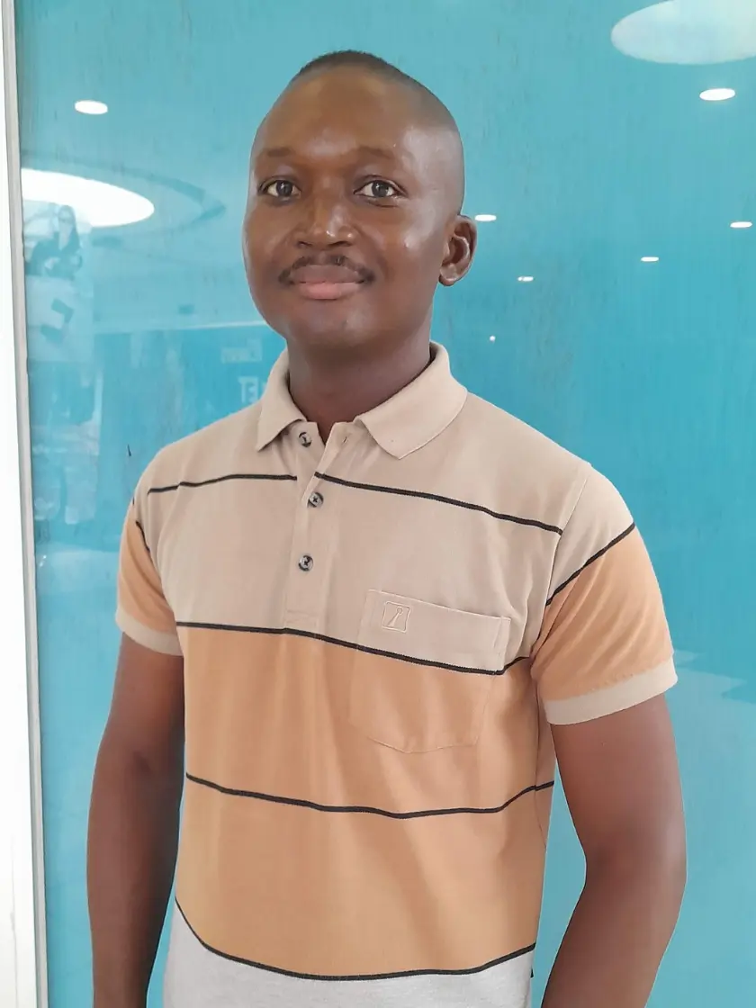 Photo of Ben Nneji standing